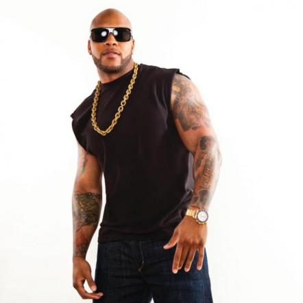 Singer Flo Rida Rocking Out in Robin's Jean At OK! Magazine's Pre-Grammy Party