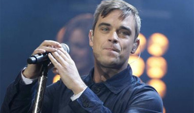 Robbie Williams Hits Back At Liam Gallagher: 'His Interviews Are Better Than His Albums'!