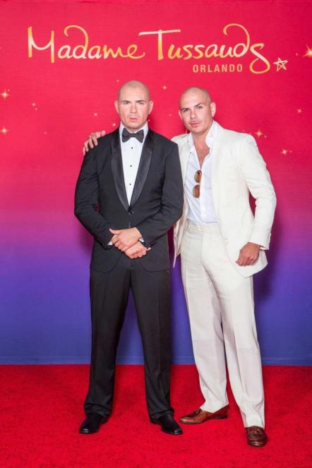 Pitbull Comes Face-To-Face With New Madame Tussauds Orlando Figure